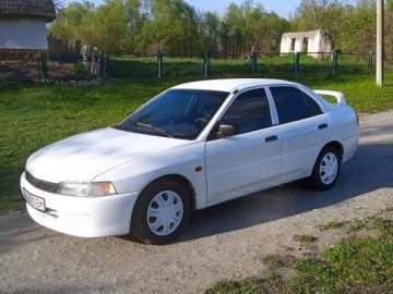 Авто Mitsubishi Lancer 1996 № 7632494