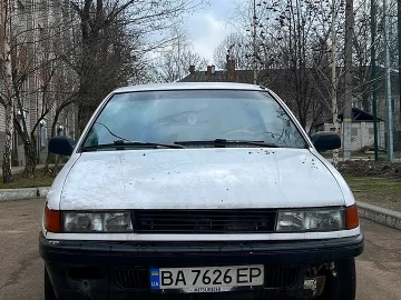 Авто Mitsubishi Lancer 1990 № 7343775