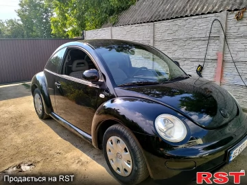 Авто Volkswagen Newbeetle 1999 № 7489841