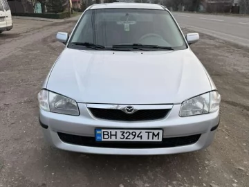 Авто Mazda 323 2000 № 7304047