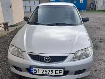 Авто Mazda 323 2003 № 7326571