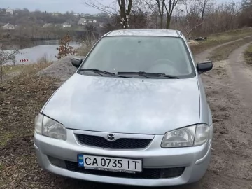 Авто Mazda 323 1999 № 7420086