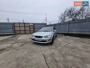 Авто Mazda 323 2001 № 7501377