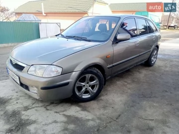 Авто Mazda 323 1999 № 7547868
