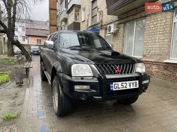 Авто Mitsubishi L 200 2003 № 7570484
