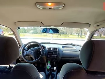 Авто Mazda 323 1999 № 7613706