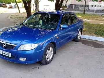 Авто Mazda 323 2003 № 7630839