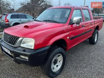 Авто Mitsubishi L 200 2003 № 7635943
