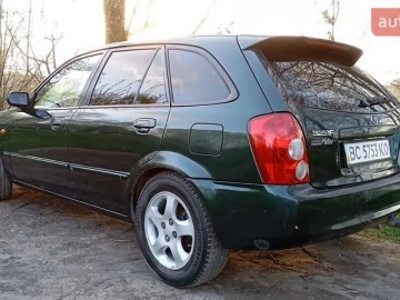 Авто Mazda 323 2001 № 7681964