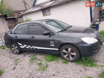 Авто Mitsubishi Lancer 2004 № 7703390