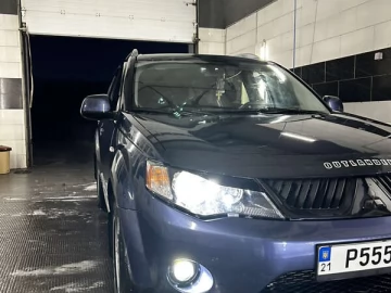 Авто Mitsubishi Outlander Xl 2009 № 7706785