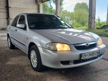 Авто Mazda 323 1999 № 7719082