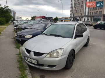 Авто Mitsubishi Lancer 2002 № 7774622