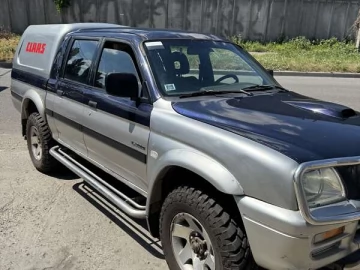 Авто Mitsubishi L 200 2005 № 7820197