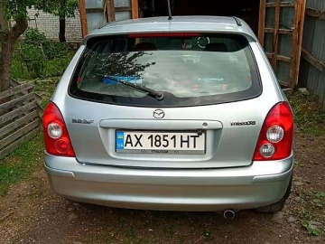 Авто Mazda 323 2002 № 7822350