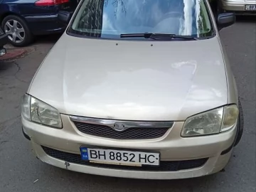 Авто Mazda 323 1999 № 7825254