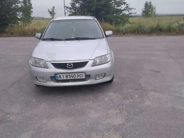 Авто Mazda 323 2002 № 7831818