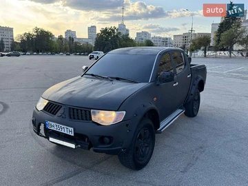 Авто Mitsubishi L 200 2009 № 7861087