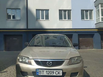 Авто Mazda 323 2002 № 7864628