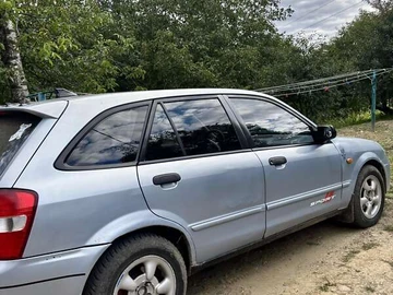 Авто Mazda 323 2001 № 7888643