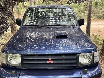 Авто Mitsubishi Pajero Mini 1999 № 7929439