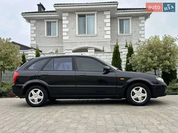 Авто Mazda 323 2003 № 7929440