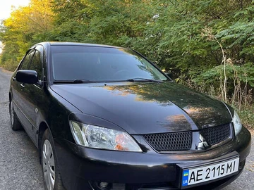 Авто Mitsubishi Lancer 2009 № 7933279