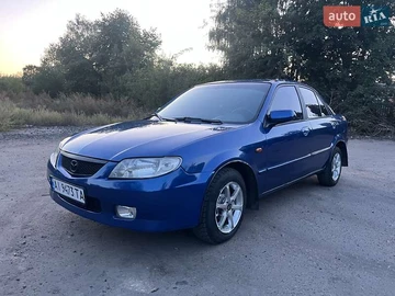 Авто Mazda 323 2001 № 7957866