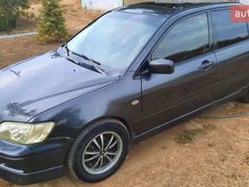 Авто Mitsubishi Lancer 2002 № 7973787