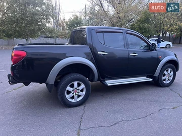 Авто Mitsubishi L 200 2009 № 8023551