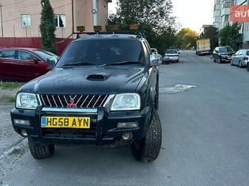 Авто Mitsubishi L 200 2004 № 8042178
