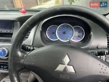 Авто Mitsubishi L 200 2009 № 8094756