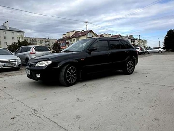 Авто Mazda 323 2001 № 8129835