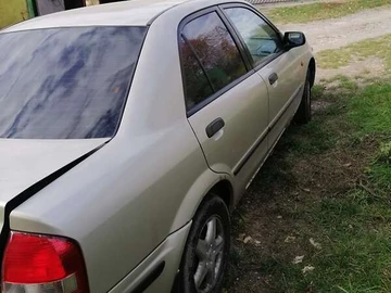 Авто Mazda 323 1999 № 8145448