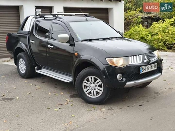 Авто Mitsubishi L 200 2009 № 8182778