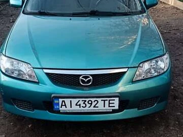 Авто Mazda 323 2002 № 8207625