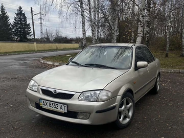 Авто Mazda 323 1999 № 8207640