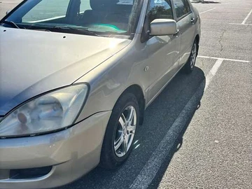 Авто Mitsubishi Lancer 2004 № 8212964