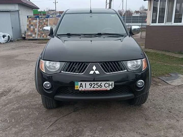 Авто Mitsubishi L 200 2009 № 8287568