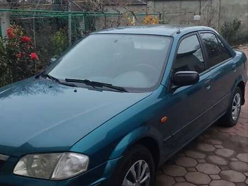 Авто Mazda 323 1999 № 8292760