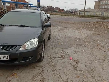 Авто Mitsubishi Lancer 2004 № 8292788