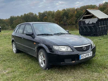 Авто Mazda 323 2003 № 8309447