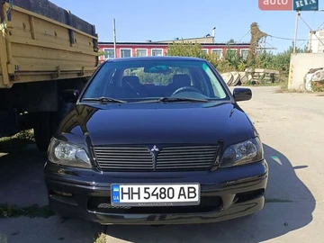 Авто Mitsubishi Lancer 2002 № 8313298