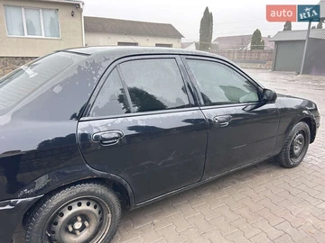 Авто Mazda 323 1999 № 8330977