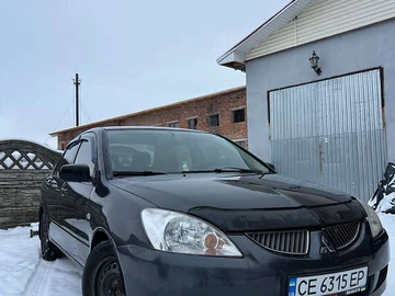 Авто Mitsubishi Lancer 2003 № 8355508