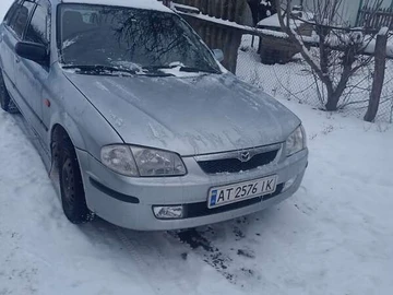 Авто Mazda 323 2000 № 8364078