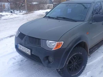 Авто Mitsubishi L 200 2009 № 8424021