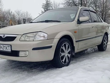 Авто Mazda 323 2000 № 8436899