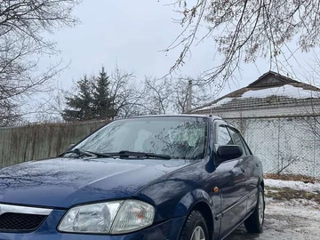 Авто Mazda 323 2000 № 8485403