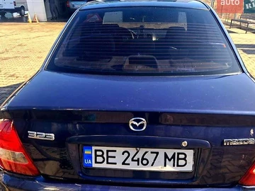Авто Mazda 323 2003 № 8609170